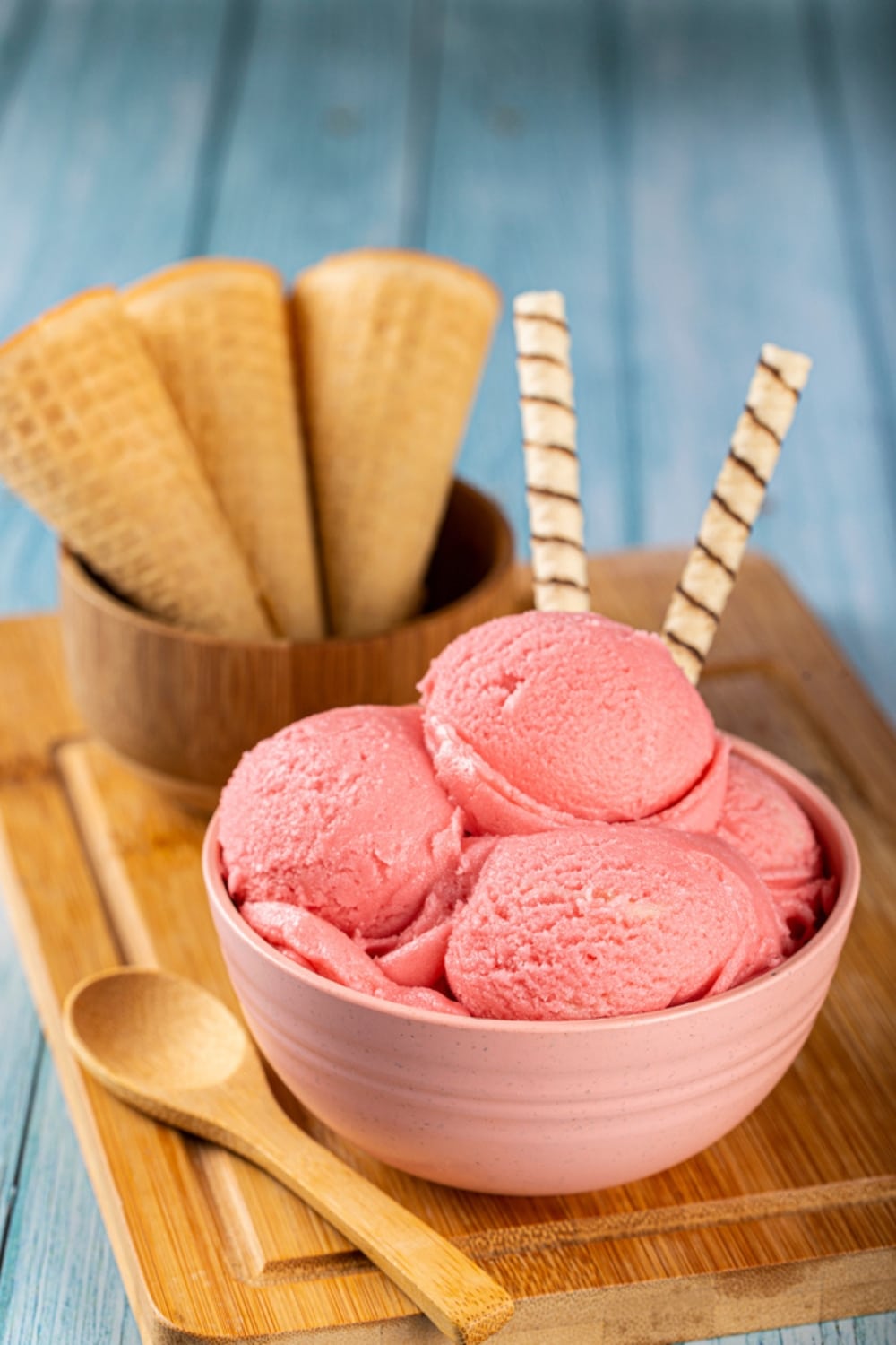 strawberry ice cream on a wooden board