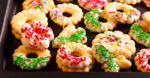 Sweet Homemade Spritz Cookies with Candies and Icing