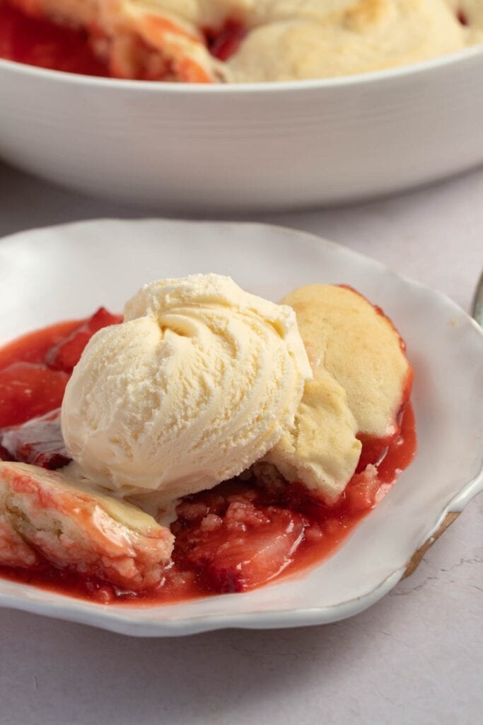 Tart and Juicy Strawberry Cobbler with Ice Cream