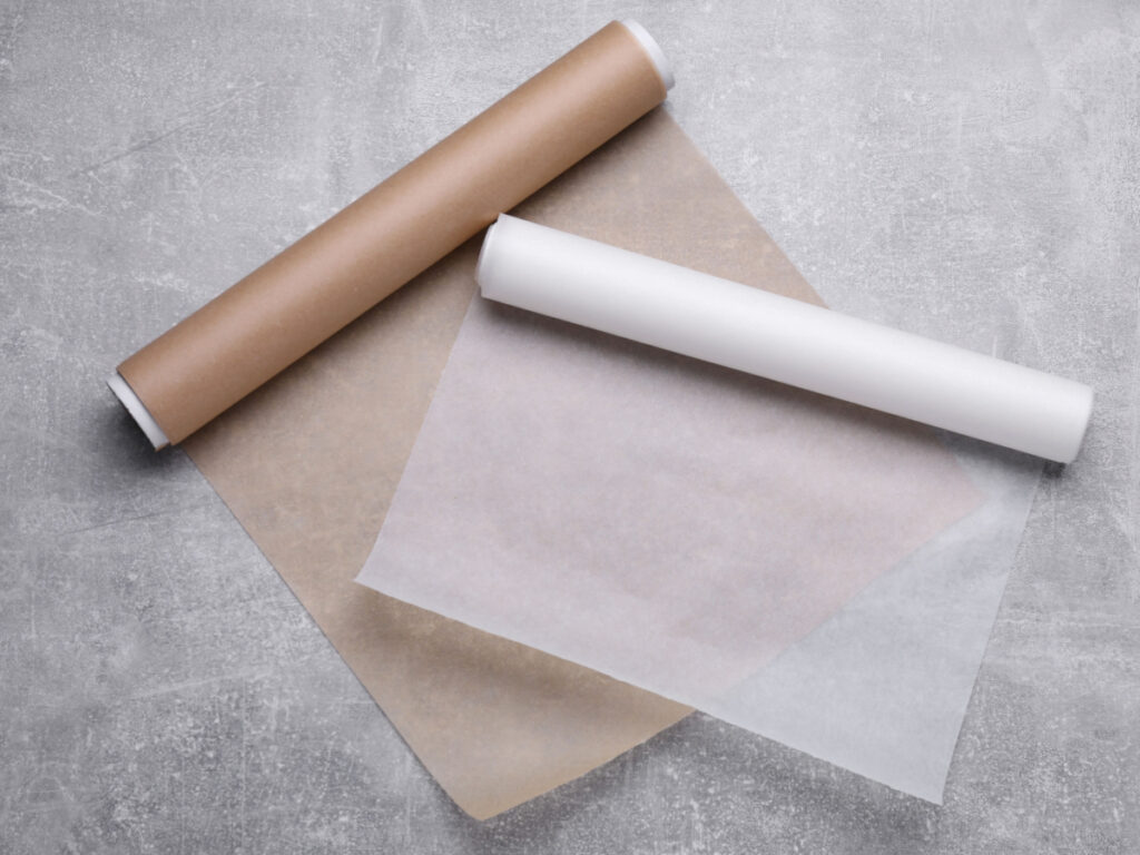 Rolls of Wax Paper on Gray Surface