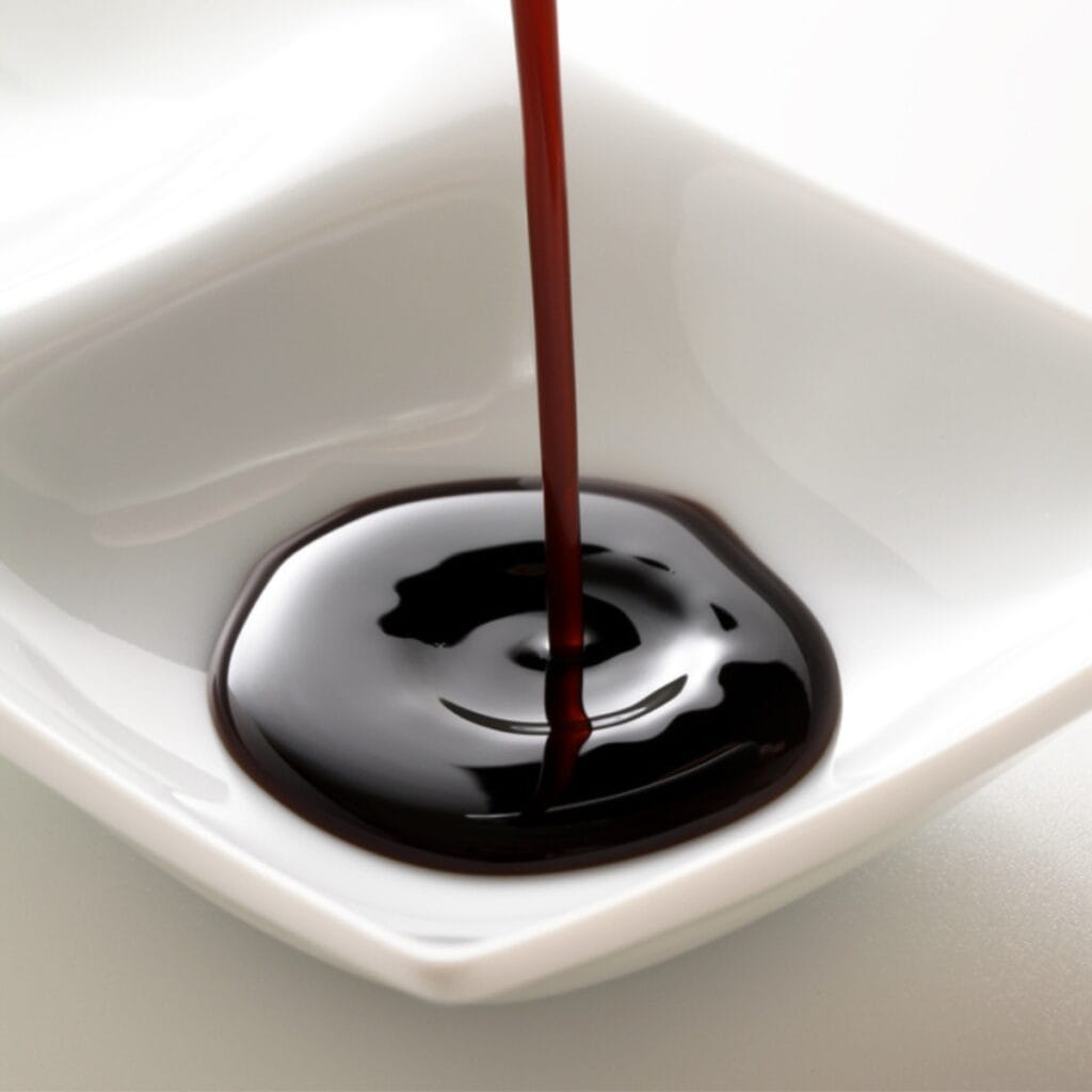 Worcestershire Sauce Poured into a Small Dip Saucer