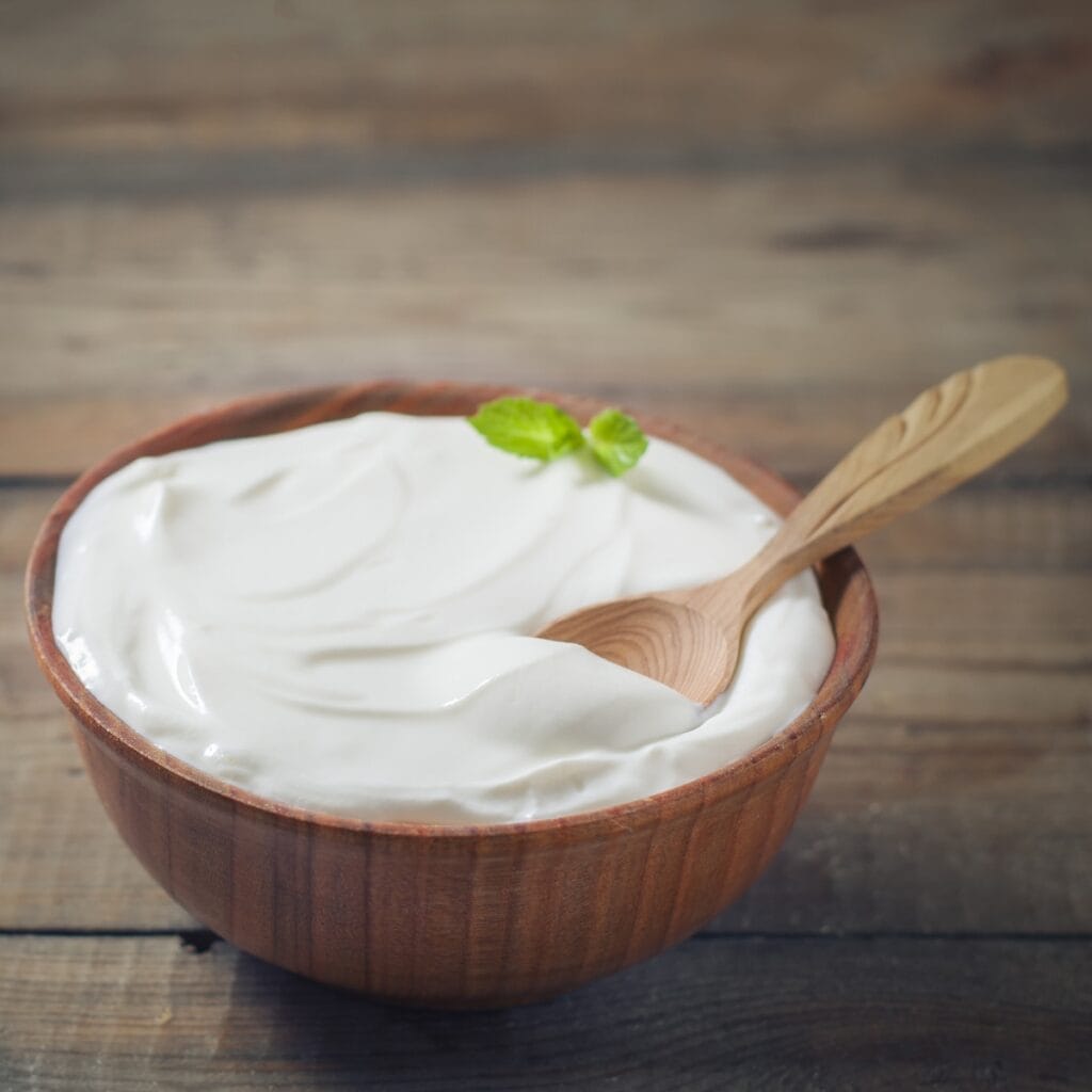 Creamy Yogurt in a Wooden Bowl