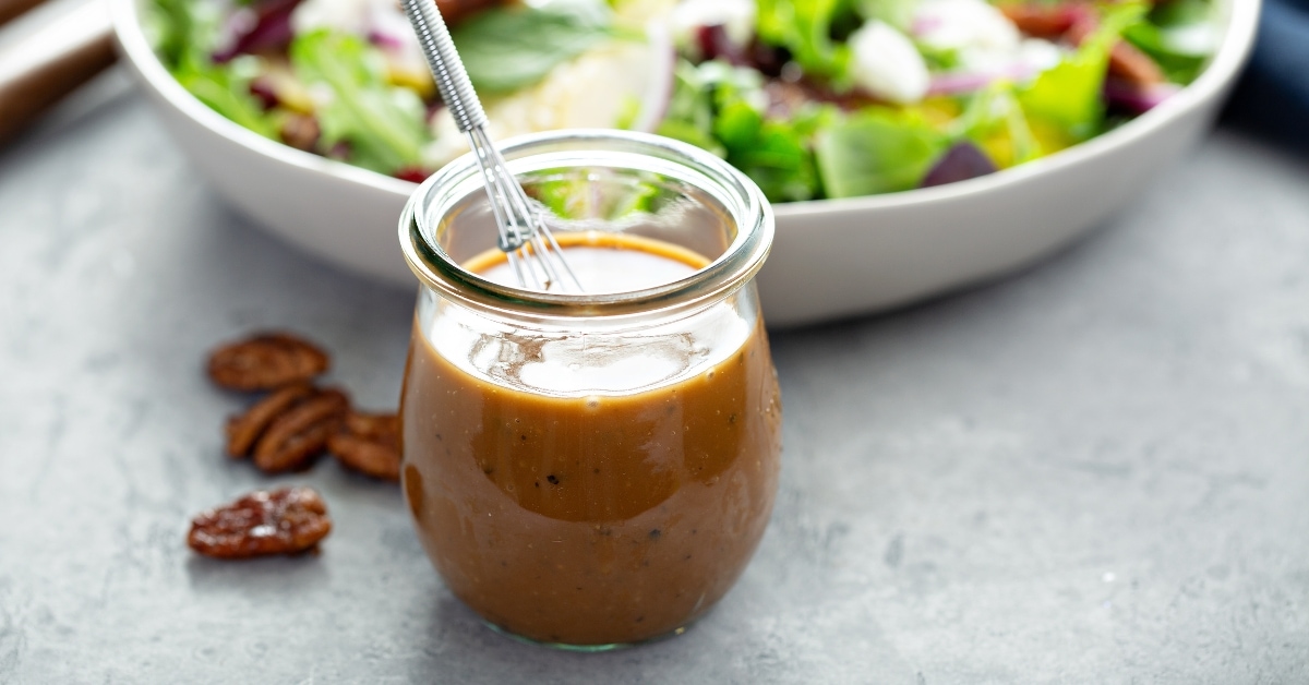 Balsamic Vinaigrette in a Bowl with Fresh Healthy Green Salad