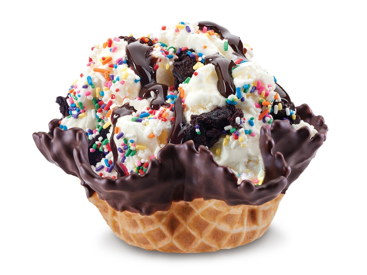 Birthday Cake Remix Cold Stone with Cake Batter Ice Cream, Brownie Pieces, Hot Fudge, and Rainbow Sprinkles in a Chocolate-Dipped Waffle Bowl