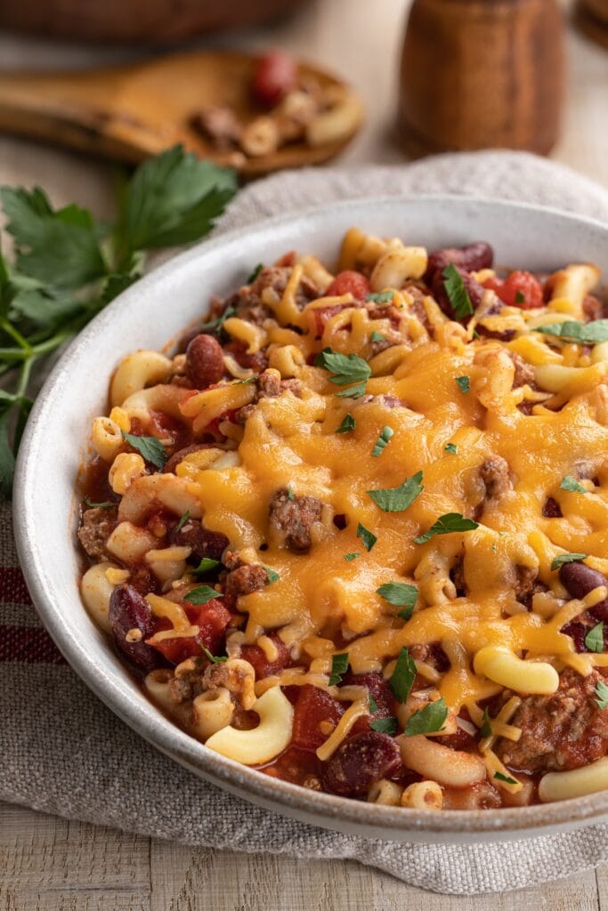 7 Best Cheeses for Mac and Cheese featuring Bowl of Chili Macaroni with Cheddar Cheese