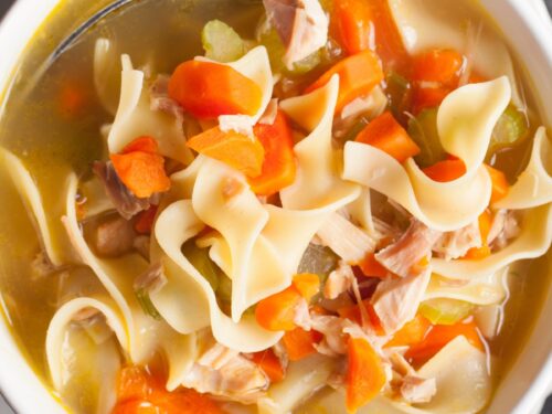 https://insanelygoodrecipes.com/wp-content/uploads/2023/08/Bowl-of-Homemade-Chicken-Noodle-Soup-with-Carrots-500x375.jpg