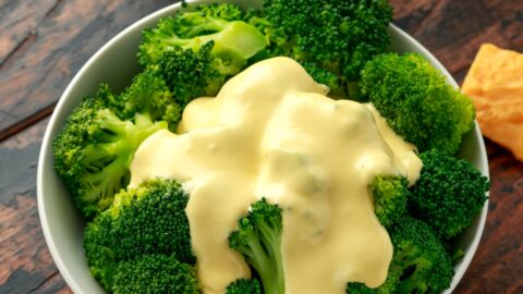 Broccoli with Cheese Sauce in a Bowl