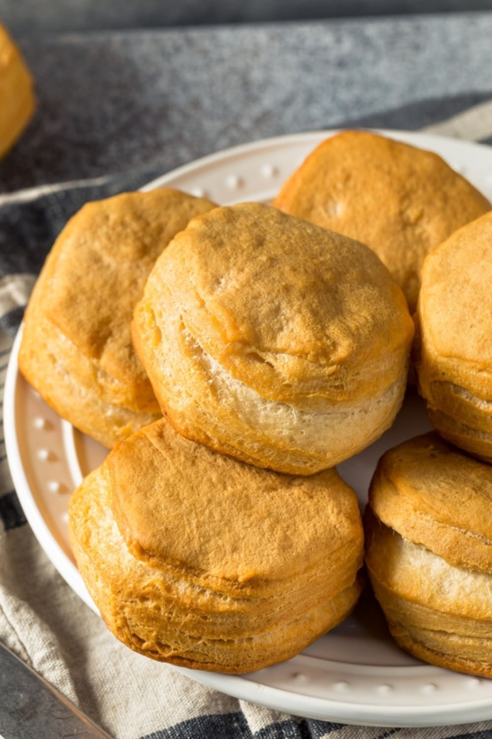 Homemade Honey Butter Biscuits served on a white plate