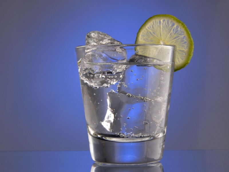 A Glass of Club Soda with Ice Garnish with Lime