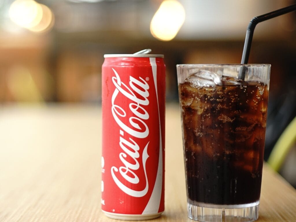 Coca Cola in Can and Iced Glass