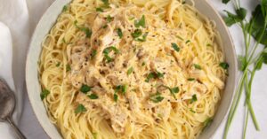 Creamy and Flavorful Homemade Crockpot Angel Chicken with Pasta in a Bowl