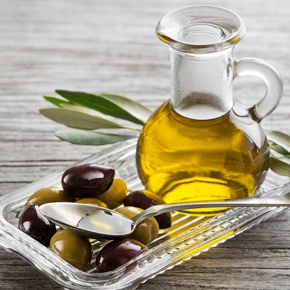 Fresh Olives, Oil and Spoon
