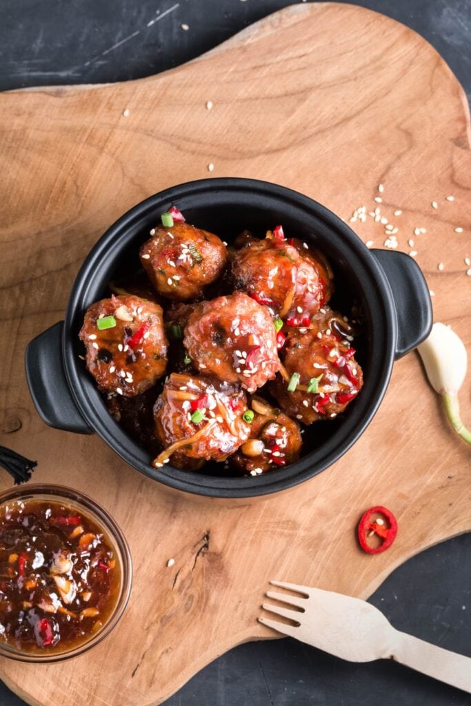 30 Best Frozen Meatball Recipes (+Easy Ideas) featuring Homemade Teriyaki Meatballs in Black Pot