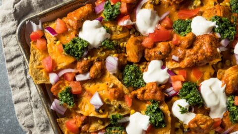 Homemade Chicken Nachos with Broccoli, Tomatoes and Onions