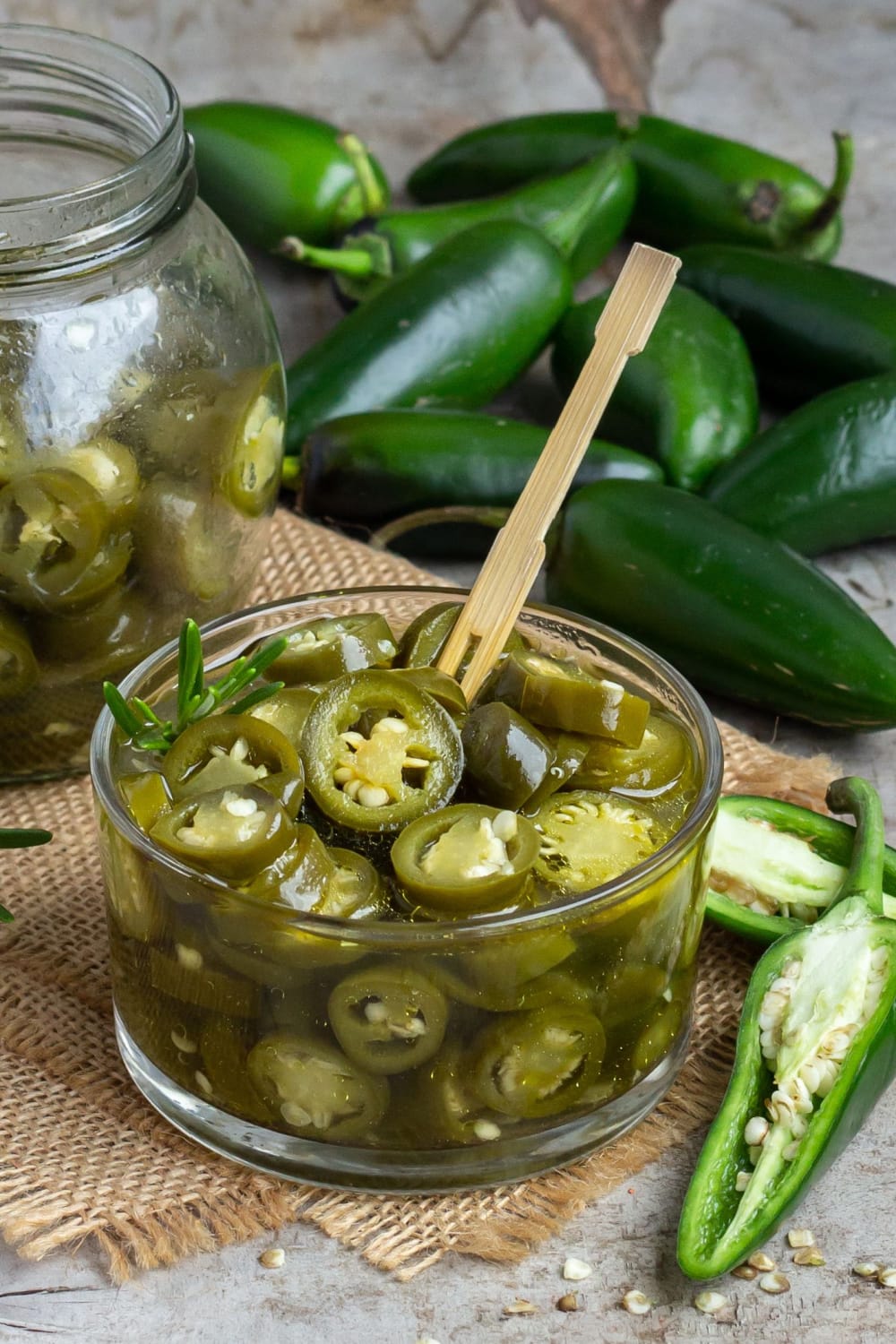 Fresh and Pickled Jalapenos on Table