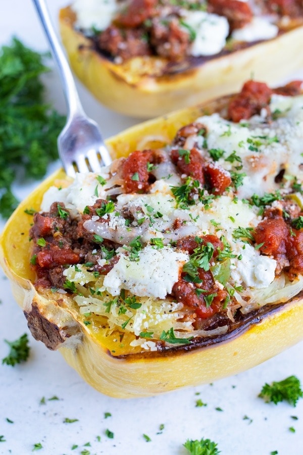 Squash slice in half topped with with beef, marinara, and cheese.