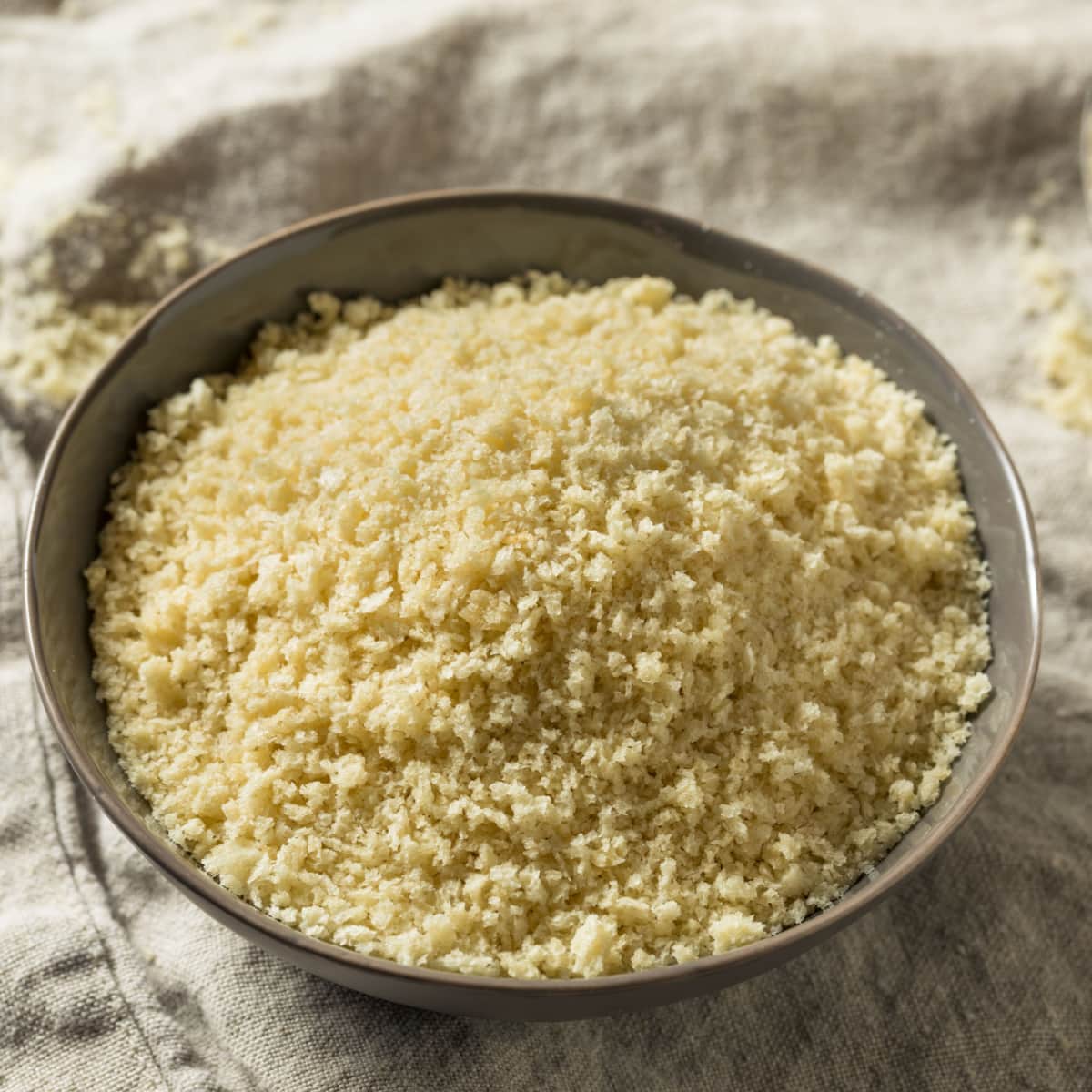 Panko Crumbs in a Bowl on a White Cloth