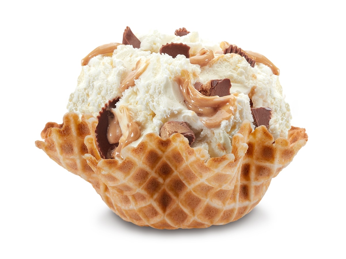 Cold Stone Reese's Peanut Butter Awesome Sauce Flavor with Sweet Cream Ice, Chunks of Reese's Peanut Butter Cups, and Peanut Butter Sauce in a Waffle Bowl