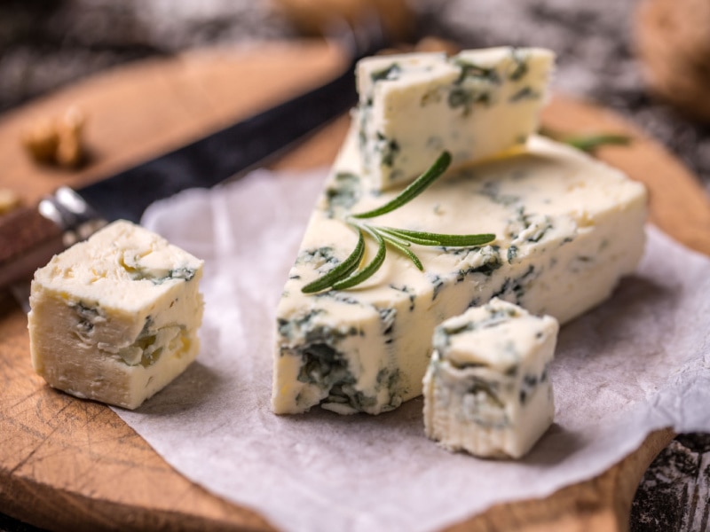 Slice of French Roquefort Cheese with Walnuts