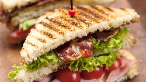 Slice of Ham and Bacon Sandwich with Tomatoes and Lettuce