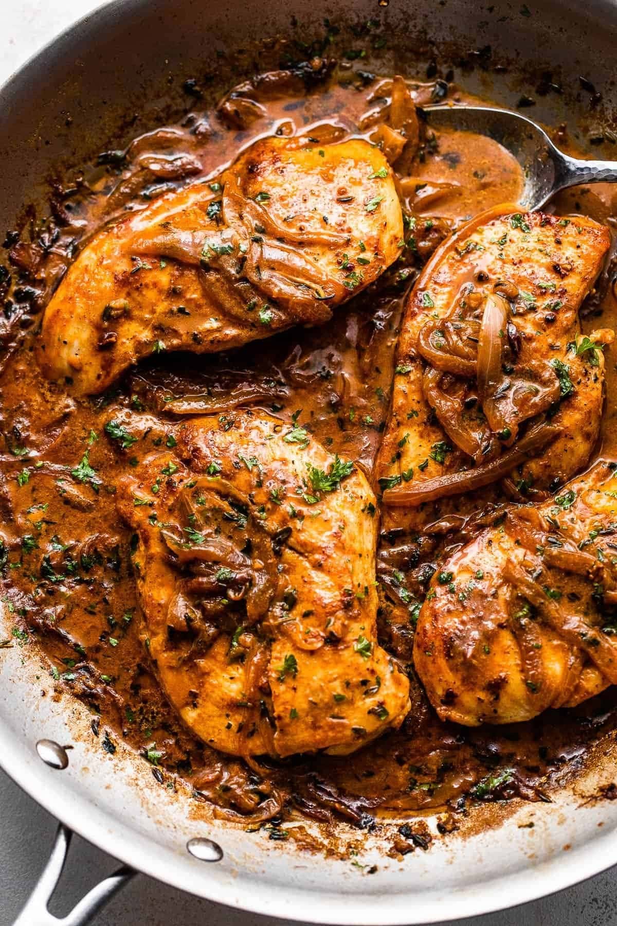 Chicken breast smothered with onion gravy. 