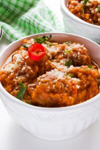 Spicy Lentil Meatballs Soup with Parmesan Cheese