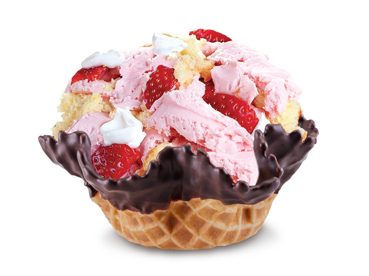 Cold Stone Surrender to Strawberry Flavor with Strawberry Ice Cream, Fresh Strawberries, Yellow Cake Chunks, and Whipped Cream in a Chocolate-Dipped Waffle Bowl