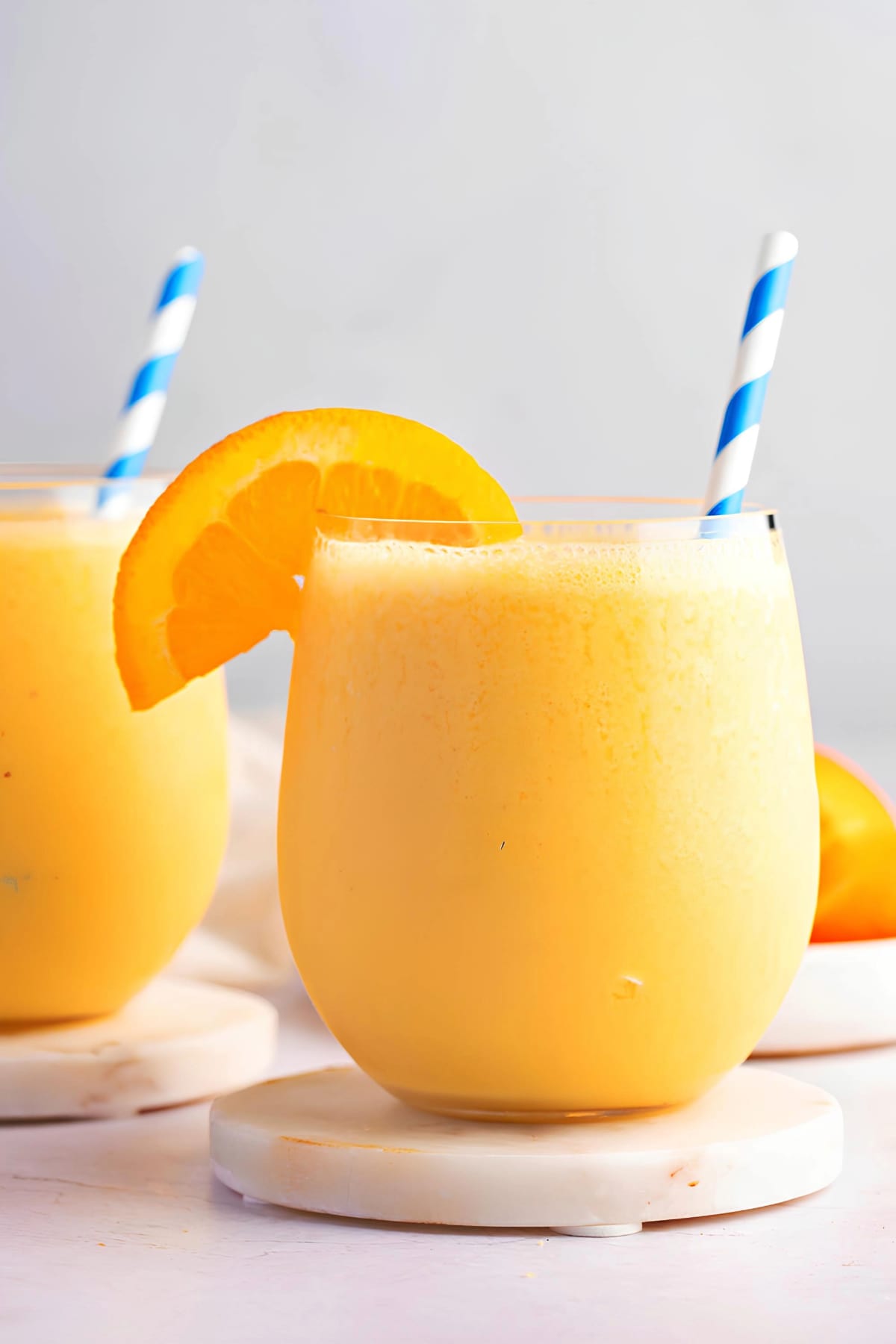 A Glass of Refreshing Orange Julius with Fresh Fruit