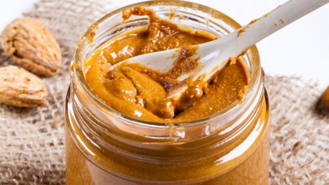 A Jar of Homemade Almond Butter with Nuts