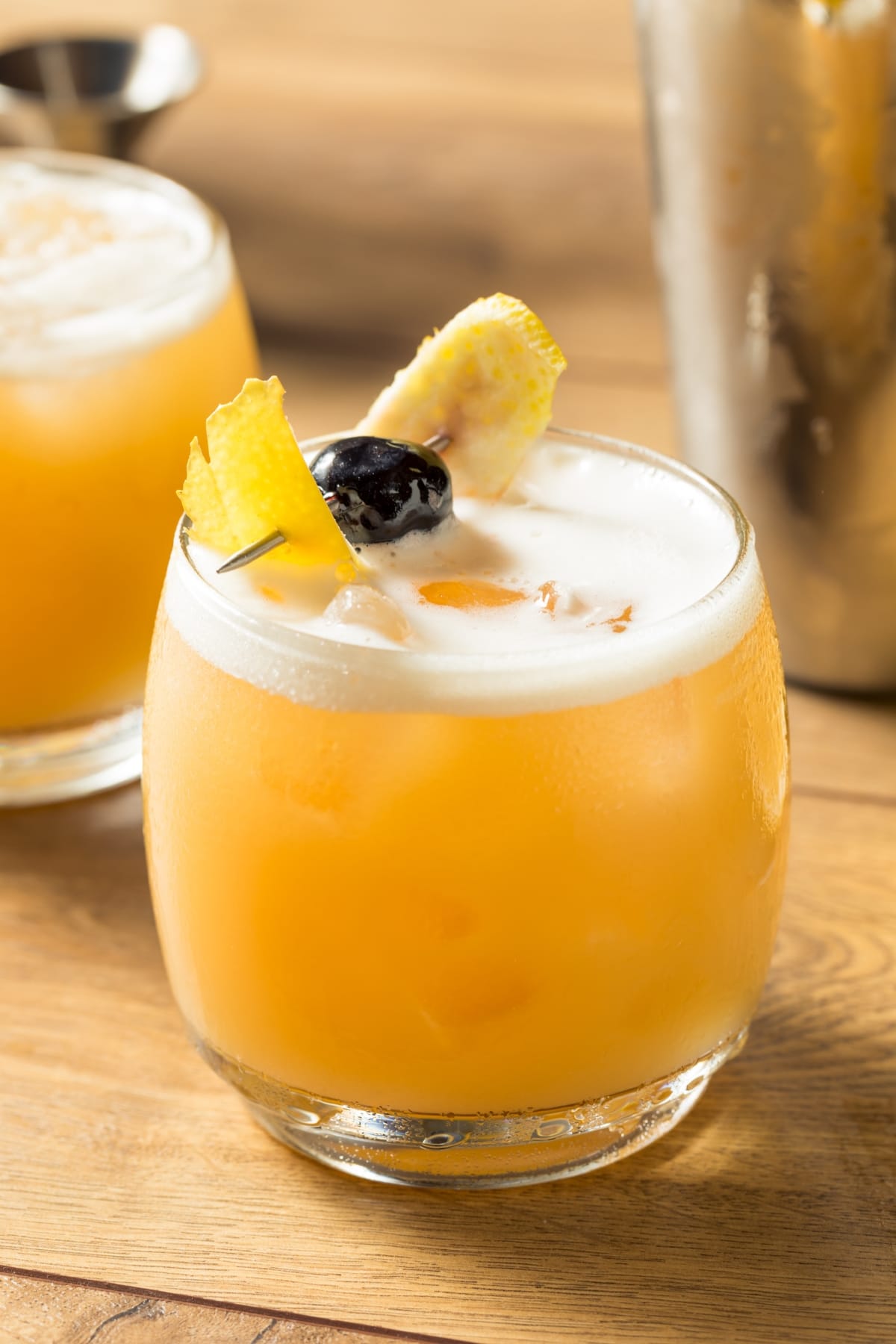 Glass of Boozy Amaretto Sour Cocktail with Pineapple 