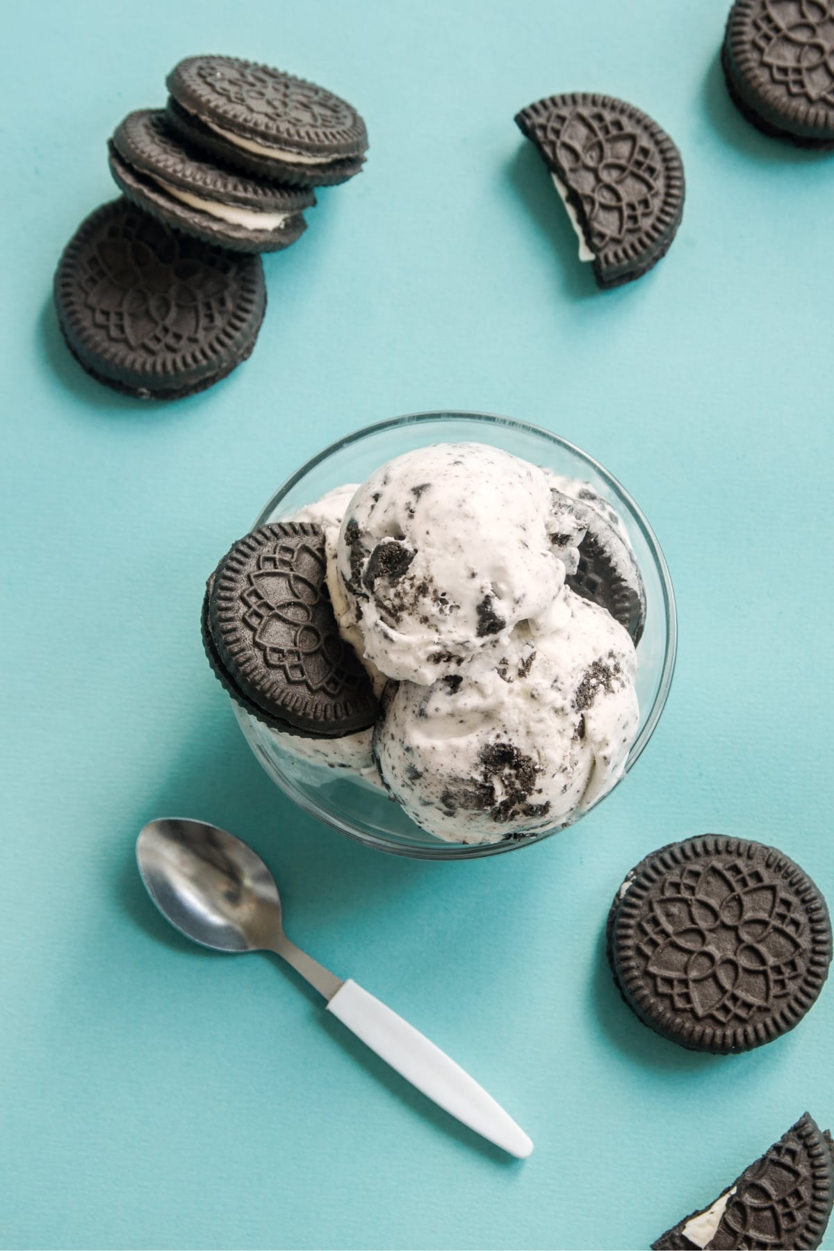 Bowl of Cookies and Cream Ice Cream on a Blue Background