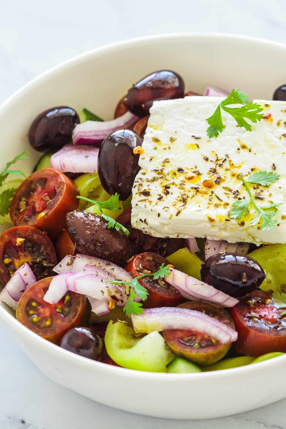 Bowl of Homemade Greek Salads with Kalamata Olives, Tomatoes and Onions
