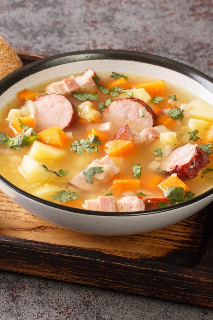 Bowl of Homemade Split Pea Soup with German Sausage, Carrots and Potatoes