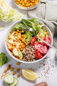 Bowl of Quinoa Salad with Tomatoes, Lime and Chickpeas