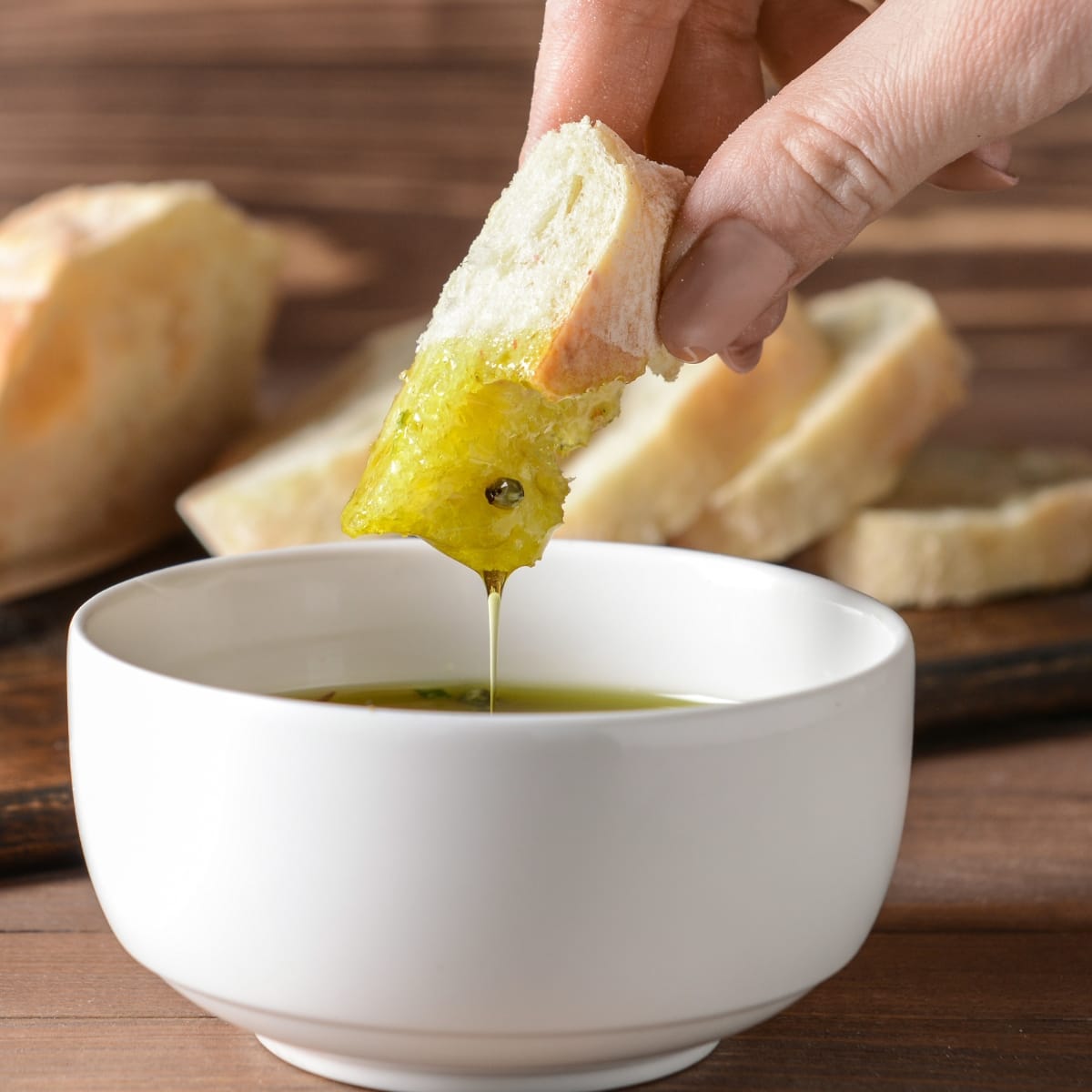Bread Dipped to a Extra Virgin Olive Oil Dippings