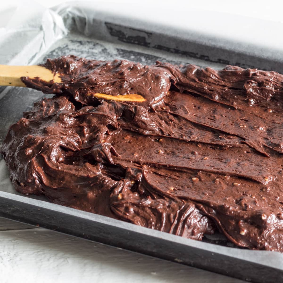 Chocolate Brownies Mix in a Pan Ready for Baking