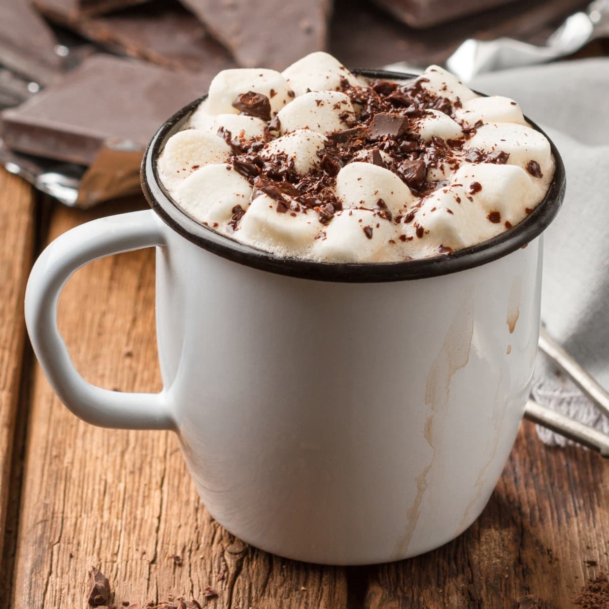 Mug of Crockpot Hot Chocolate Topped With Mallows and Chocolate