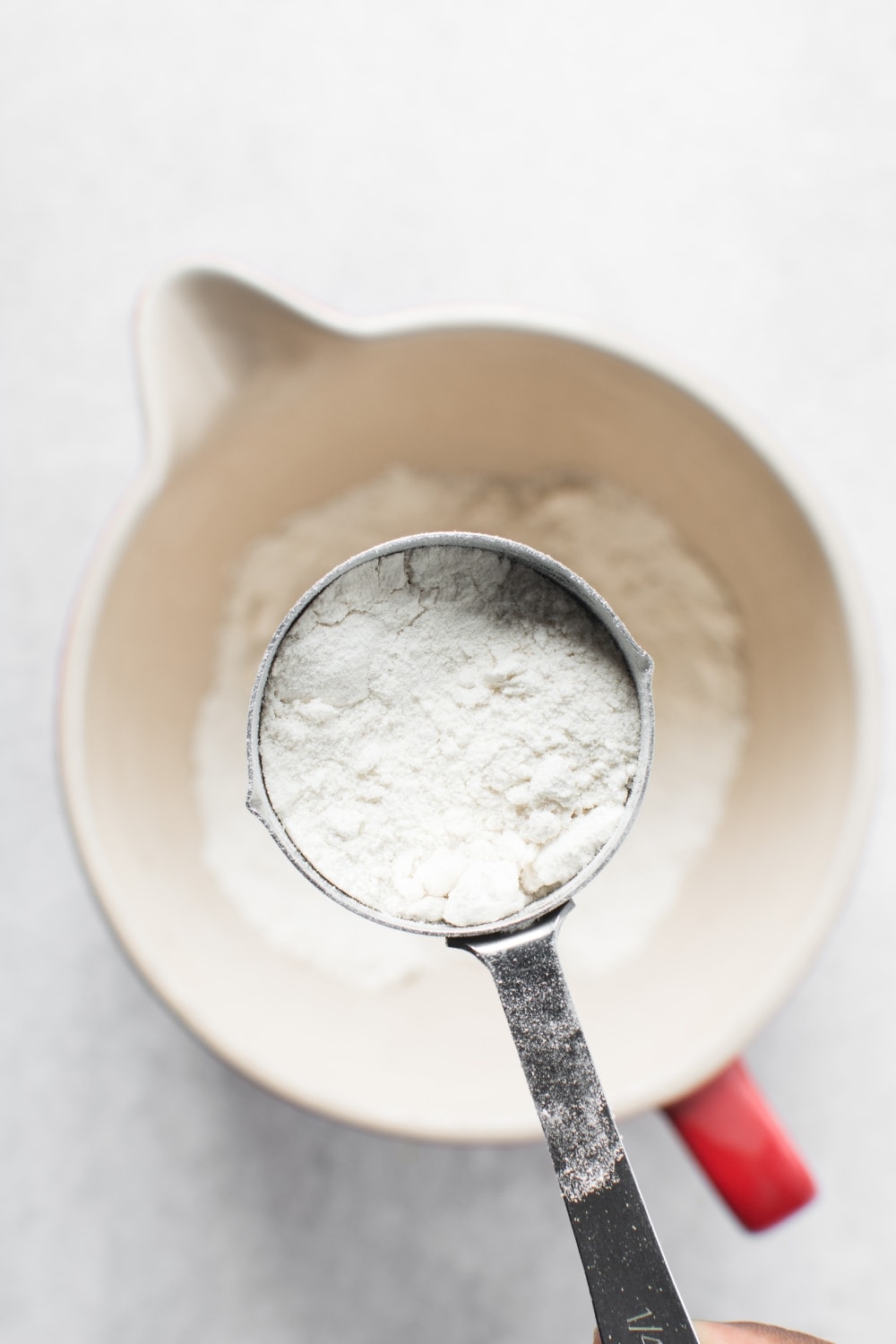 Flour Scooped With a Measuring Spoon