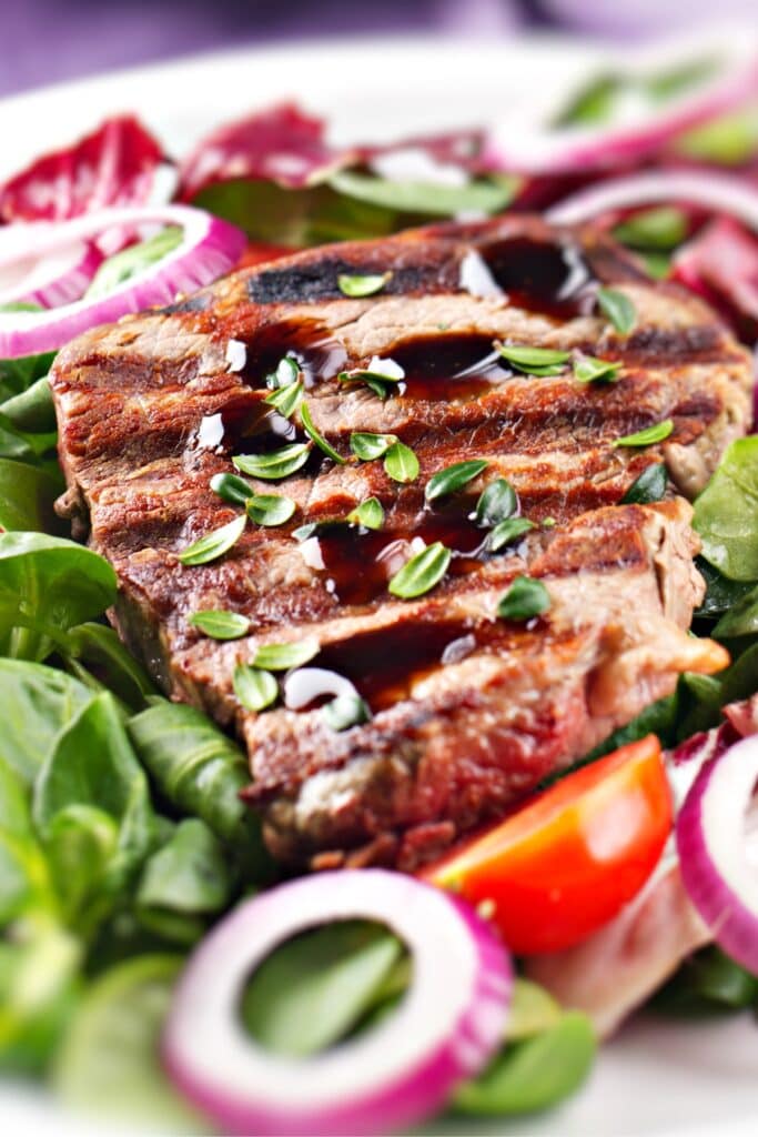 25 Easy High-Protein Salads (Healthy Recipes) featuring Homemade Balsamic Steak Salad with Onions and Tomatoes