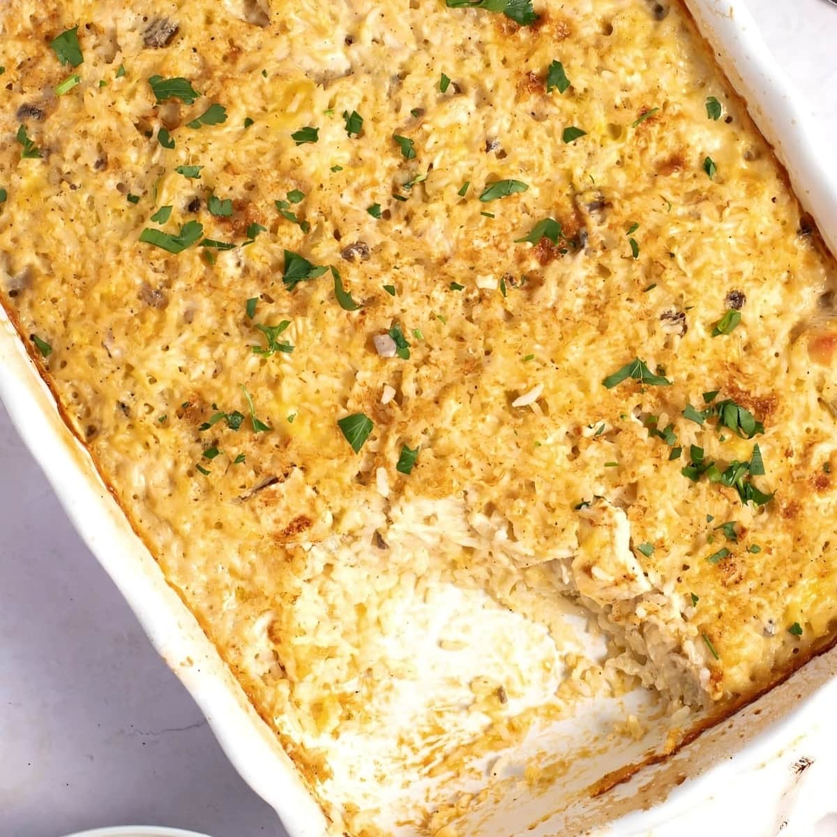 Casserole with rice, cream chicken and herbs