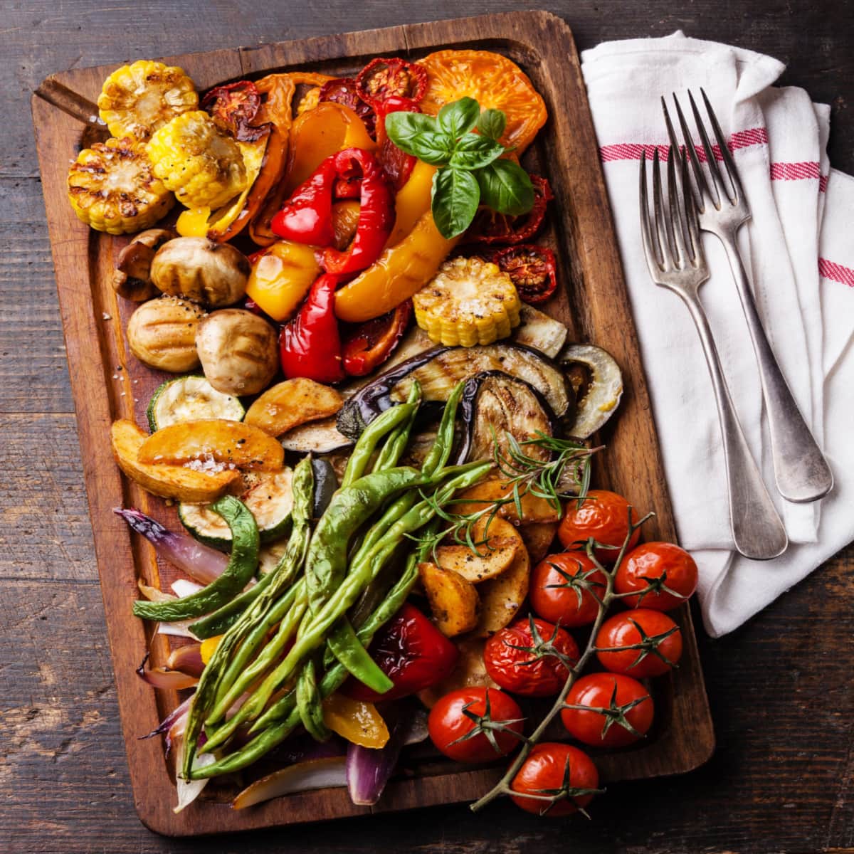 Homemade Grilled Vegetables Including Corn, Tomatoes and Bell Peppers
