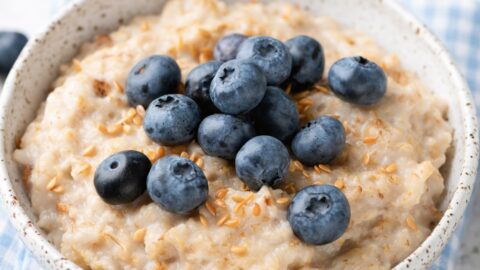 Scottish Oats in a Bowl with Fresh Blueberries and Flax Seed