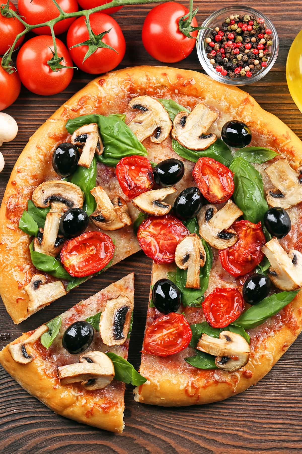 Homemade Oven Pizza with Mushrooms, Tomatoes and Olives