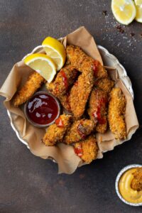 Homemade Chicken Strips with Ketchup and Mustard Sauce