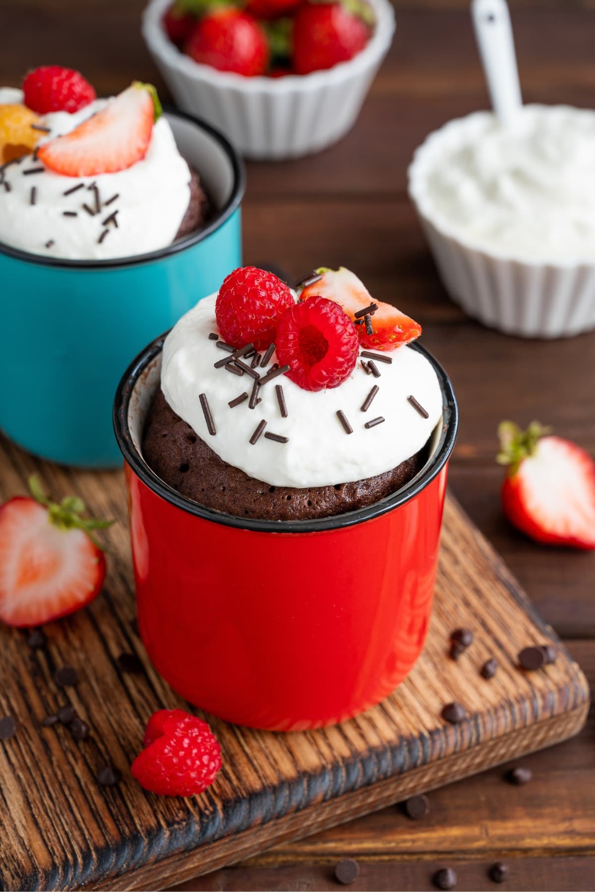 Homemade Chocolate Mug Cake with Raspberries and Whipped Cream