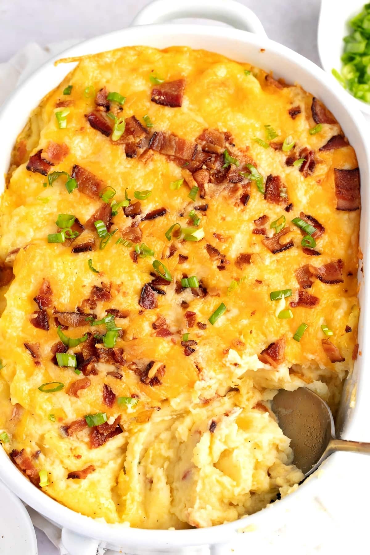 Loaded Mashed Potatoes with Bacon, Melted Cheese and Green Onions