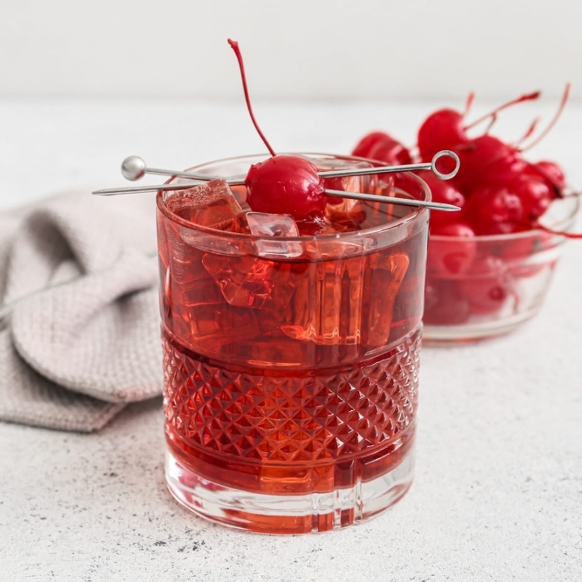 Manhattan Cocktails on the Rock With Cherries on Top