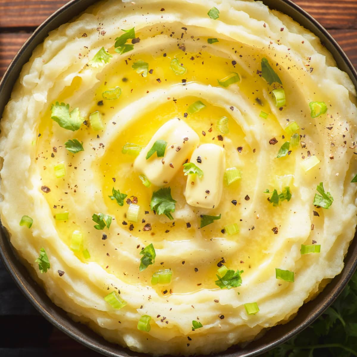 Bowl of Mashed Potatoes with Butter and Spices