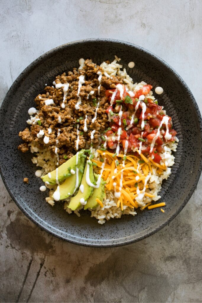 Mexican Taco Bowl with Salsa, Avocado, Ground Beef and Cheese