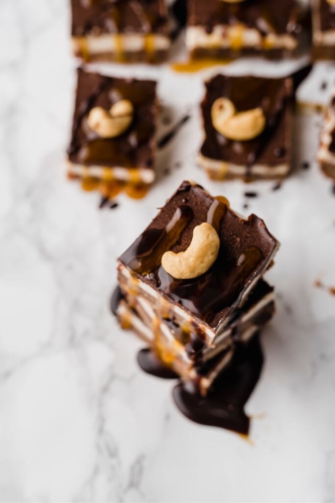 14 Easy No-Bake Fudge Recipes featuring No-Bake Chocolate Fudge with Cashew Nuts and Chocolate Drizzle